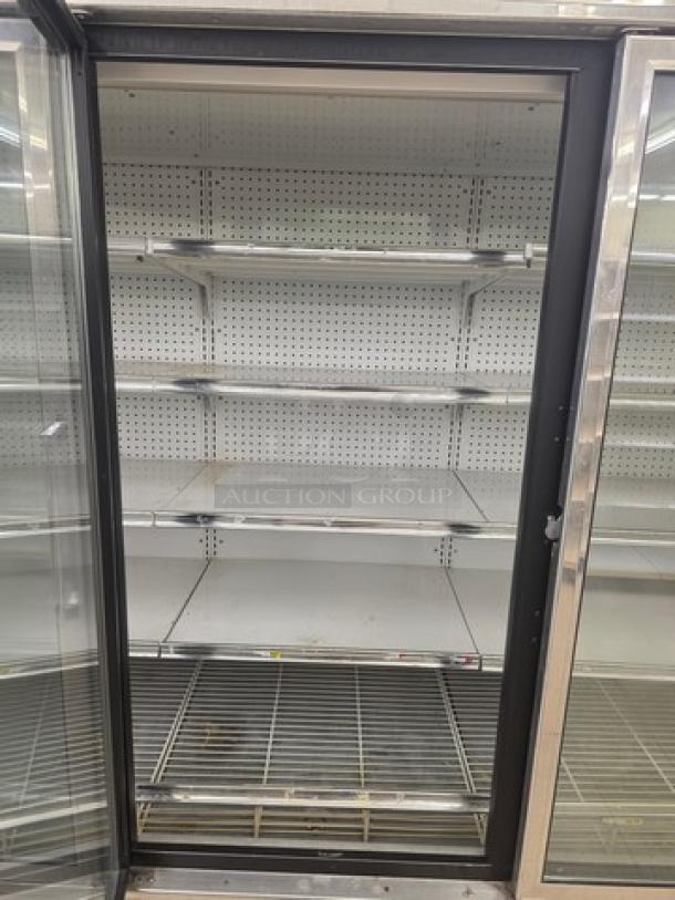 Kysor/Warren freezer display case model LV5H1-5U, no compressor, stainless steel finish, glass door, adjustable shelves, sold by door.