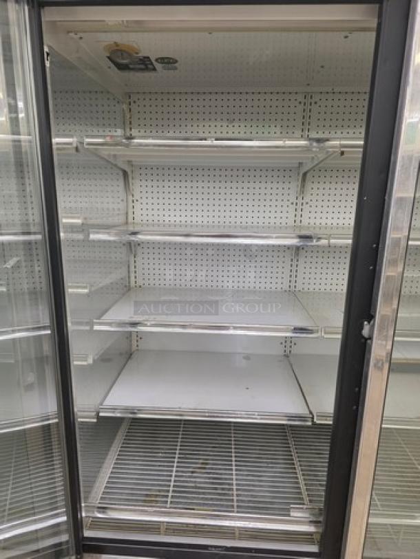 Kysor/Warren freezer display case model LV5H1-5U, no compressor, multiple shelves, glass door, for safe removal by buyer.