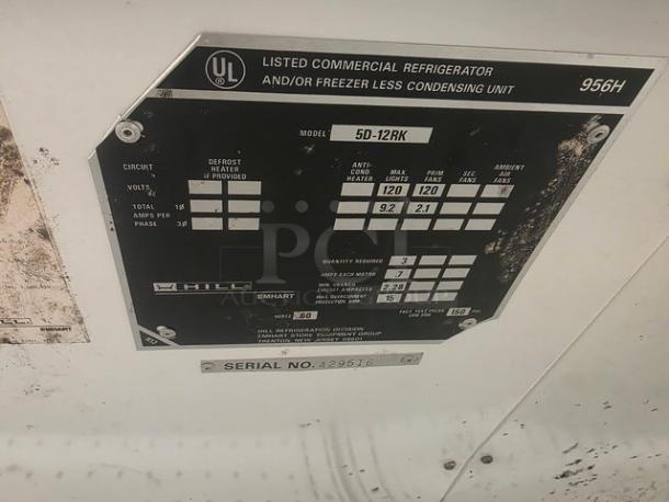 Hill Emhart deck case model 5D-12RK label, 956H, serial 429510, features voltage and amps details. No compressor included.