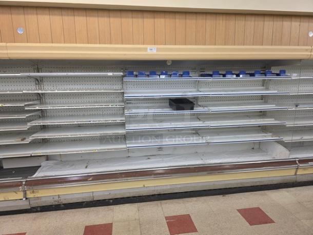 Hill Emhart multi deck cases, 76' total, no compressor. Includes two 5D-8RK 8’ and five 5D-12RK 12' cases. Buyer removes.