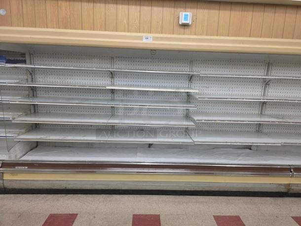 Hill Emhart multi deck cases, no compressor, 76' total length, various shelf configurations. Buyer responsible for removal.