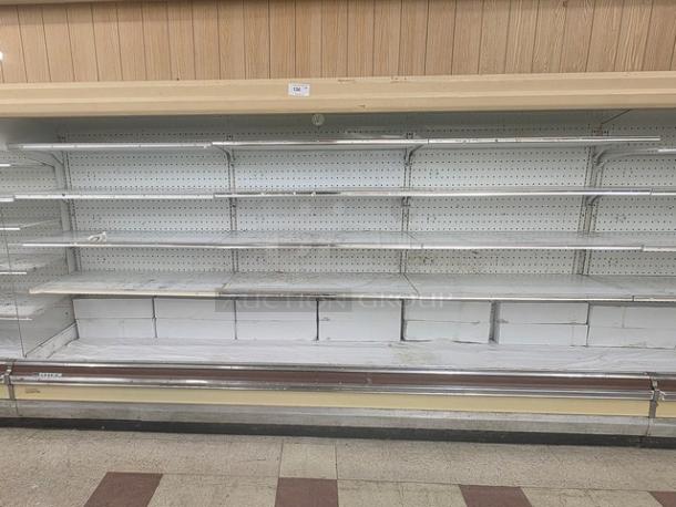 Hill Emhart multi-deck display cases, 76' total length, with shelving. No compressor included. Used, no visible tags.