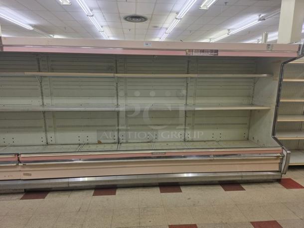 12' Hussmann DM12ZA multi-deck case, 1992 model, without compressor; features multiple shelves and open front.