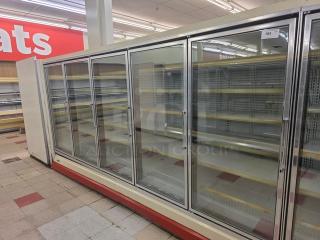 Hussmann Gel-5 frozen food doors with shelving, no compressor, stainless steel, sold by door. Buyer removes. 25 available.