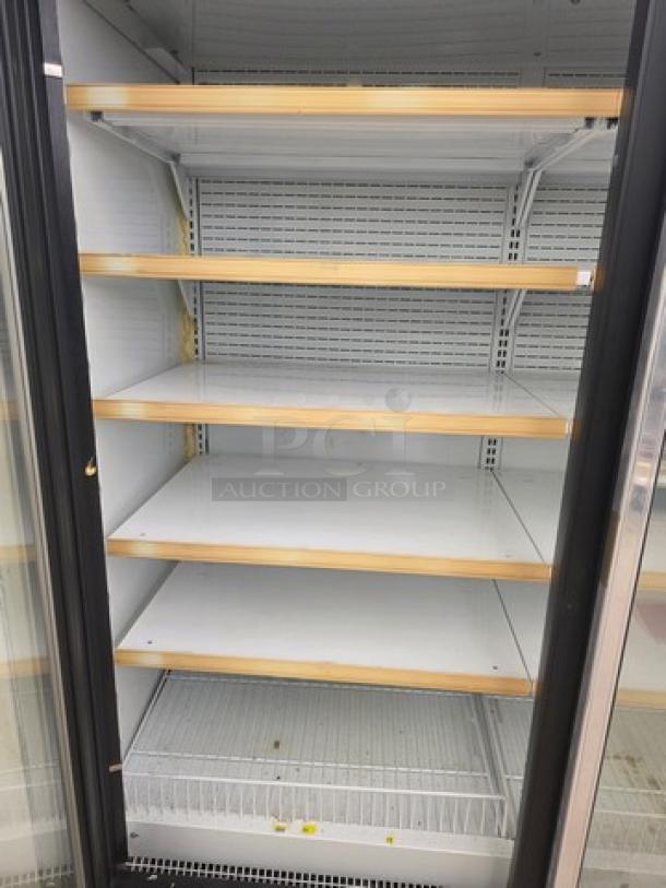 Hussmann Gel-5 frozen food door with shelving, no compressor, white interior, metal shelving, sold individually.