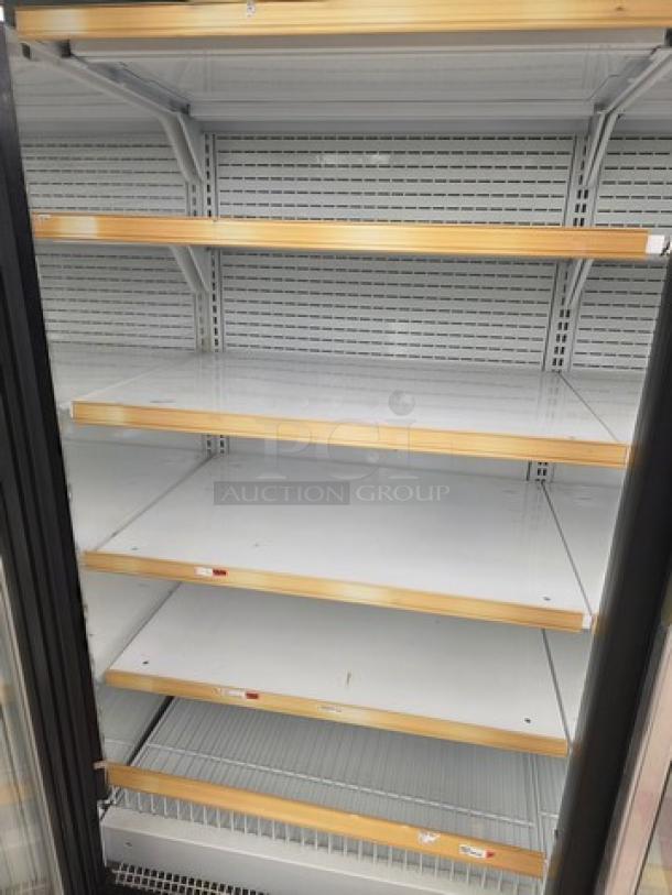Hussmann Gel-5 frozen food door with shelving, no compressor, sold per door. Clean, intact shelving, model Gel-5.