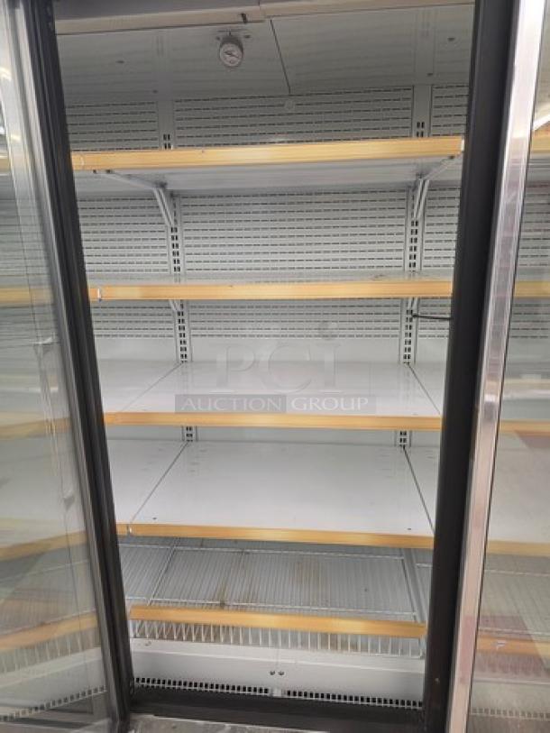 Hussmann Gel-5 Frozen Food Door with Shelving; no compressor; sold per door; shelves included; used condition.