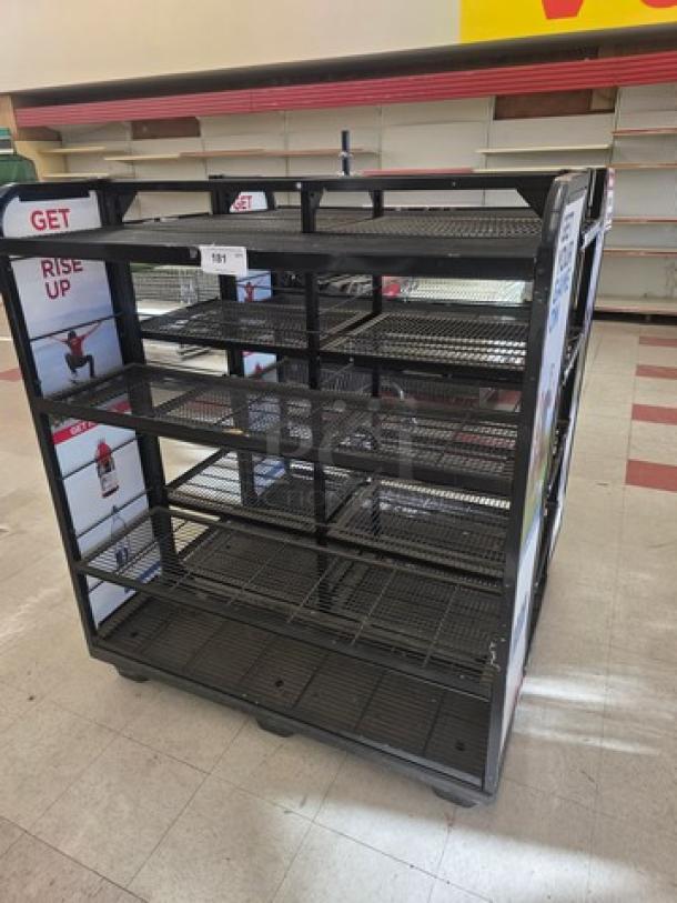 Black metal retail display rack with multiple wire shelves, "GET" and "RISE UP" branding on side panels, in good condition.