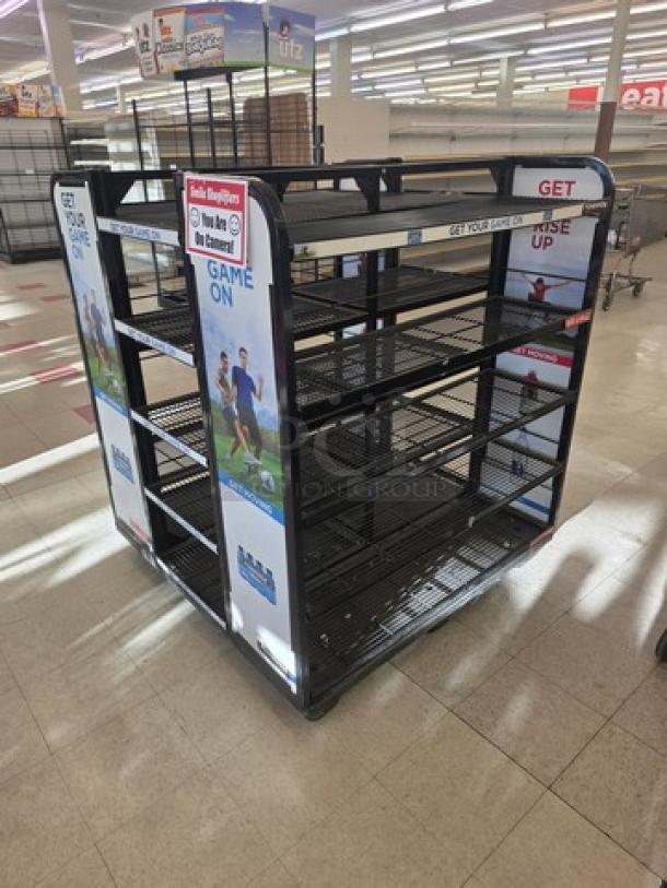Sturdy retail display rack with multiple shelves, promotional side banners, and a metal frame, ideal for showcasing products.