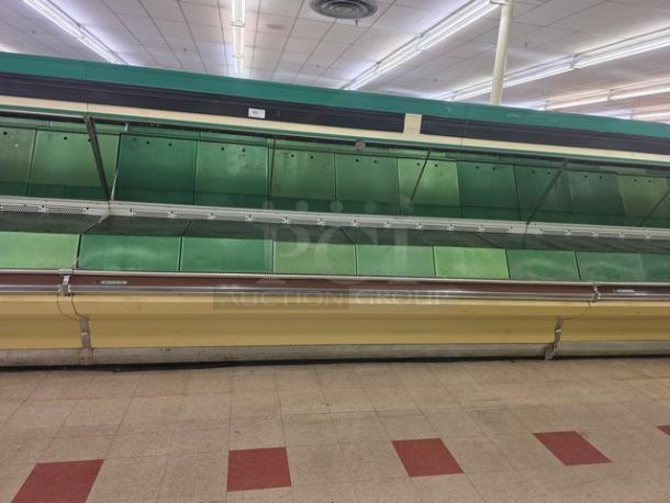 Hill Emhart HLP-12 36' produce section in fair condition, featuring green shelving. Buyer responsible for removal.