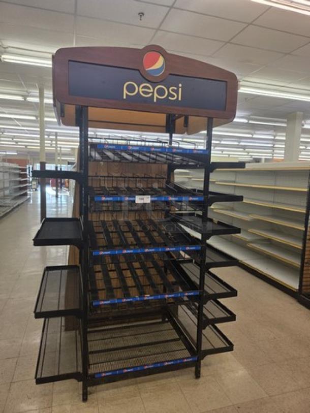 Pepsi retail display rack with multiple metal shelves, wooden top sign, and Pepsi branding, in good condition.