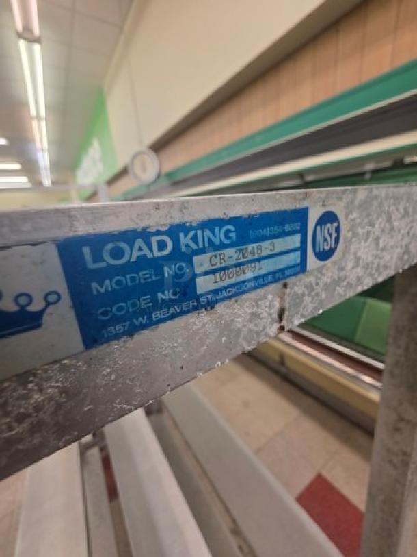 Load King aluminum shelf cart, model CR-2048-3, visible wear, NSF certified, blue label with specifications.