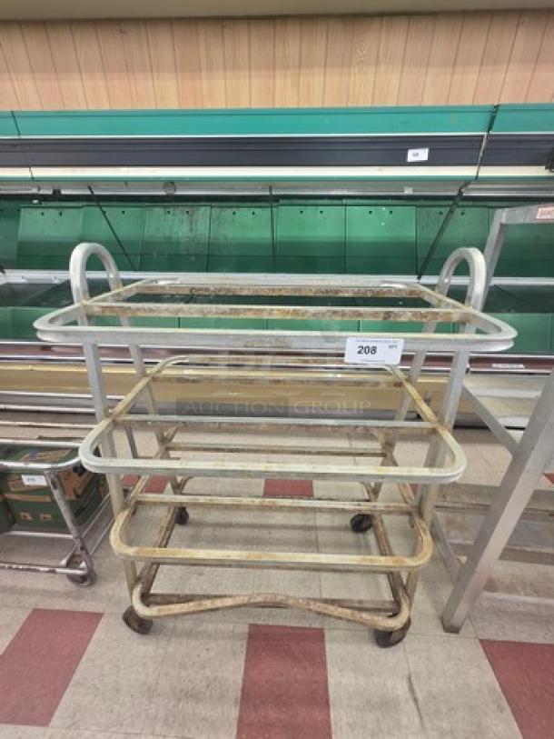 Aluminum mobile shelf cart with three glass shelves, sturdy frame, visible wear, and numbered tag 208.