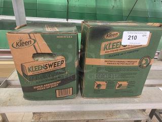 Lot of 2 boxes of Kleen Sweep Eco-Friendly Sweeping Compound. Super absorbent, made in USA. Tag indicates quantity and auction info.