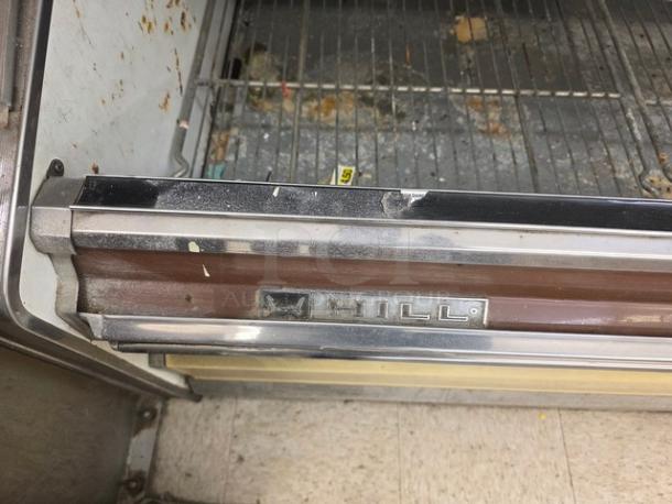 Hill Remote Dairy & Cheese Merchandising Case section, visible Hill logo, metal frame, no compressor included, used condition.