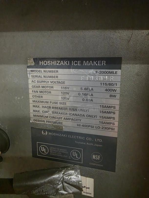 Hoshizaki Flake Ice Machine, Model F-2000MLE, voltage 115/60/1. Features serial number, gear motor details, and UL/NSF labels.