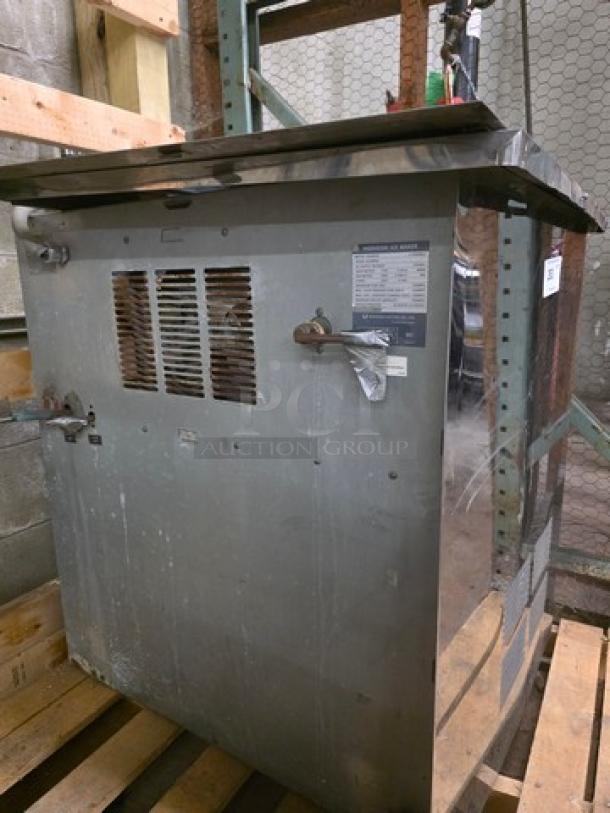 Hoshizaki Flake Ice Machine, Model F-2000MLE, stainless steel, industrial-grade, visible scuffs, factory label intact.