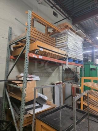 Industrial pallet racks with metal frame, in used condition. Contents on rack not included. Ideal for warehouse storage.