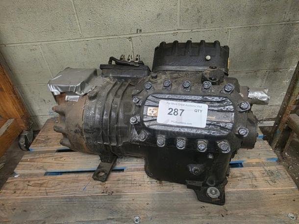 Copeland 4DK3R22ME-TSK-800 semi-hermetic compressor, used condition, 208-230/460/3/60, visible auction label.