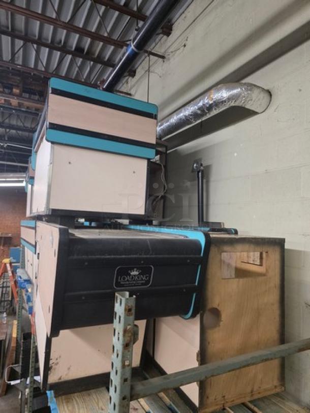 Supermarket checkout counter with blue accents and Lovdkin branding; condition unknown.