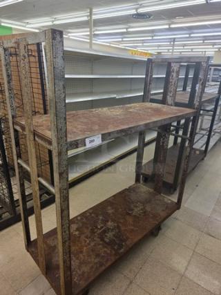 Heavy-Duty Mobile Shelving Cart with three rusted shelves, sturdy metal frame, and wheels. Item number 200 displayed.