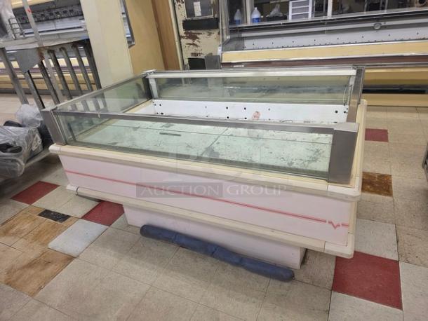 Hussmann ISMG-5R Refrigerator Island Merchandiser, single-deck, glass display, used condition, white with red accents.