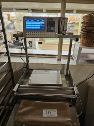 Digi SM5500B Manual Meat Wrapping Station. - Item #1222279