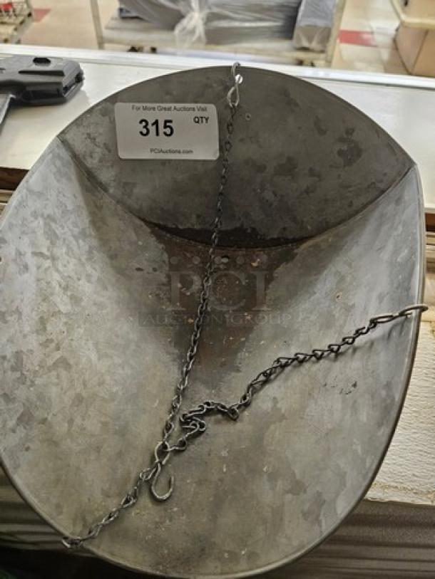 Chatillon Century Series Hanging Scale in used condition with visible wear and rust; includes a chain and auction tag number 315.