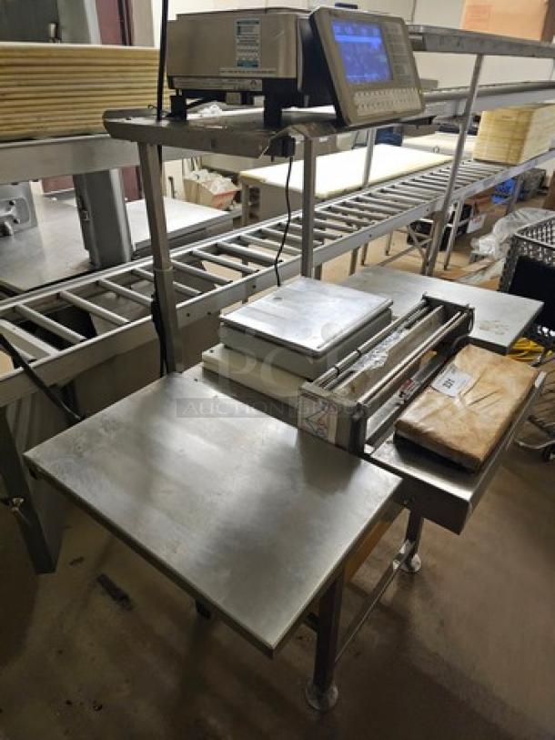 Digi SM5500a Manual Meat Wrapping Station, features weigh scale and digital display, stainless steel, good condition.