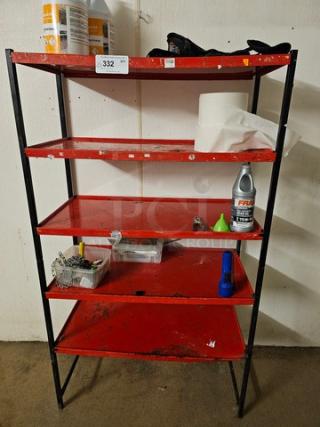 Red metal shelf with five tiers, black frame. Signs of wear and paint chipping. Contents not included. Tag labeled "332".