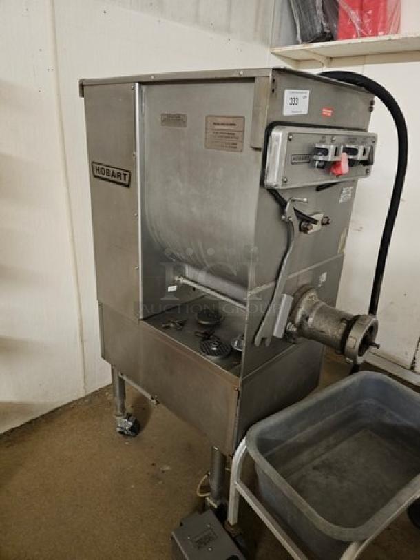 Hobart 4246HD meat grinder & mixer, 208V, 60 Hz, 8.5 HP, 30.0 AMP, in used condition. Features durable steel body and visible control panel.