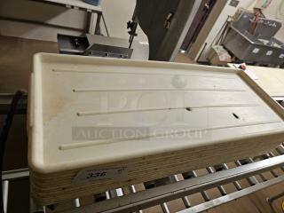 Lot of 14 plastic trays, white, rectangular, used condition with visible wear and staining. Labeled "336".