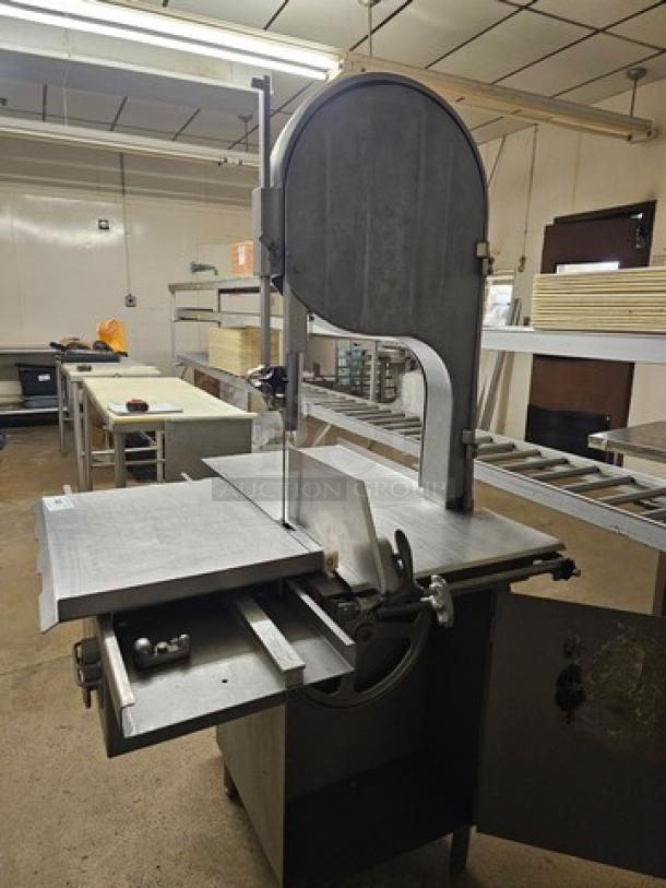 Biro Meat Saw model 3334, industrial-grade, metal construction, bandsaw blade, used condition, suitable for meat processing.