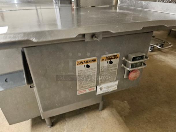 Biro Meat Saw Model 3334 in stainless steel, appears gently used. Visible warning labels and red safety button.