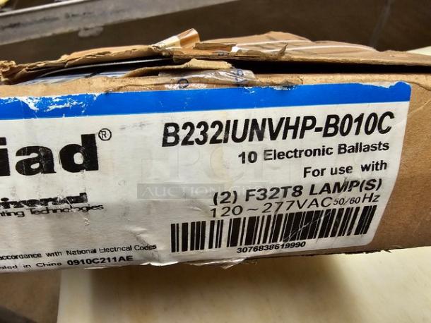 Two boxes of Universal Triad B232IUNVHP-B010C electronic ballasts, for (2) F32T8 lamps, 120-277VAC, box slightly worn.