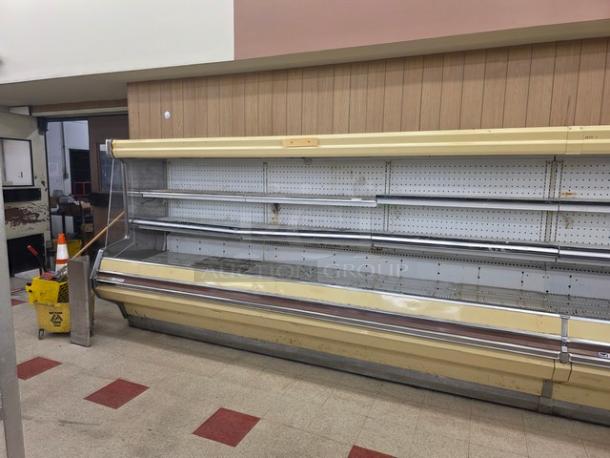 Hill remote merchandising cases, three 12-ft sections, total 36 ft. No compressor. Used condition. Buyer responsible for removal.