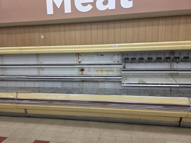 Hill remote merchandising cases, 36 ft total, three 12 ft sections. No compressor. Requires buyer removal. Visible wear.