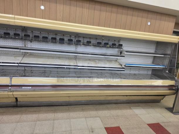 Lot of Hill Remote Merchandising Cases, three 12 ft sections, 36 ft total. No compressor. Buyer to handle removal.