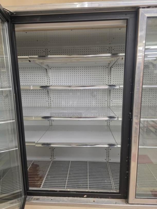 Lot of two Kysor/Warren LV5HF1-3U freezer display cases, six doors, no compressor, shelves inside, sold by door.