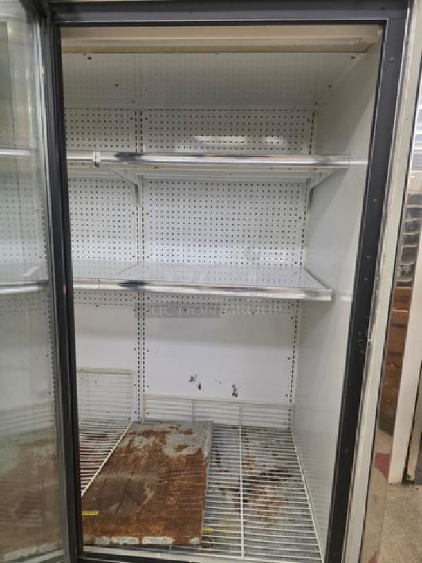 Lot of two Kysor/Warren freezer display cases, model LV5HF1-3U, no compressor, six doors, buyer removal.
