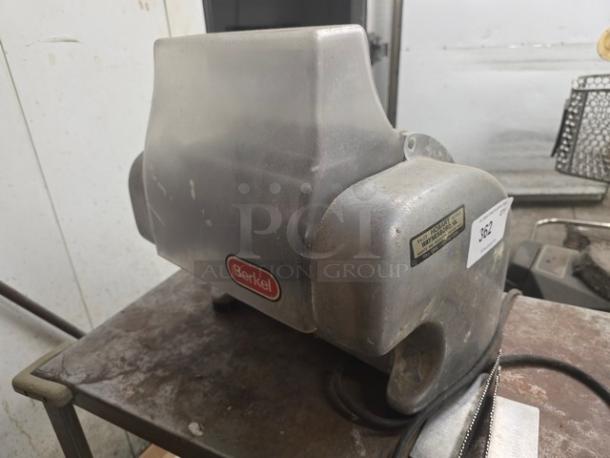 Hobart Commercial Meat Tenderizer Model 703B. Used condition, metal casing, labels partially visible.