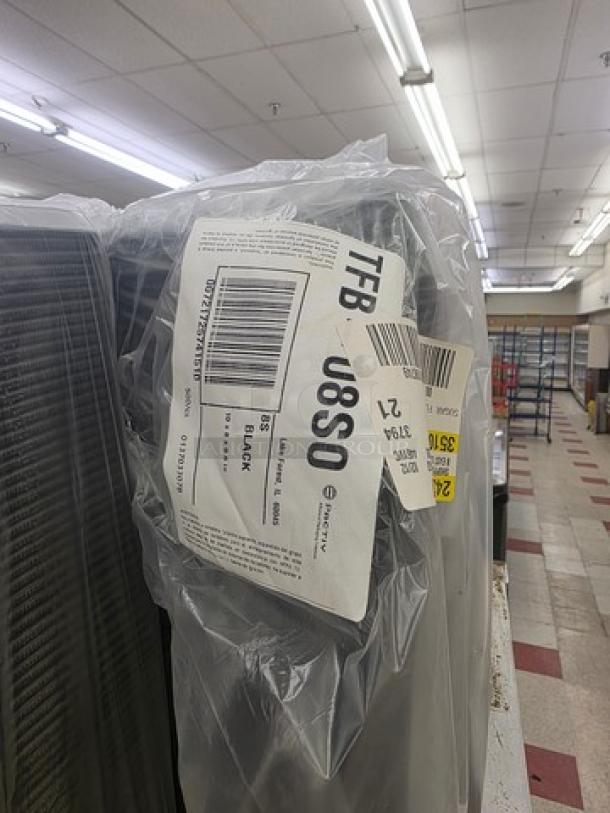 Clear plastic-wrapped disposable food trays stack, labeled 'TFB U8SO', indicating black color and quantity.