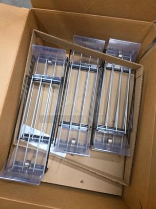 Box of wire spring-loaded shelf pushers in new condition, with clear plastic fronts, ideal for retail display organization.