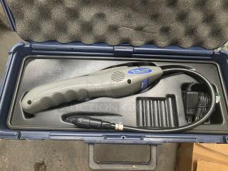 Yellow Jacket Accuprobe refrigerant leak detector with heated sensor in a protective case. Includes power adapter. Mint condition.