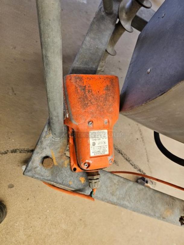 Hobart Meat Grinder & Mixer with visible motor and controls, showing signs of wear. Tag displays model details and specifications.