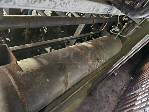 Commercial refrigeration compressor rack in used condition, 50 HP, designed for low temp 404A. Removal tools required.