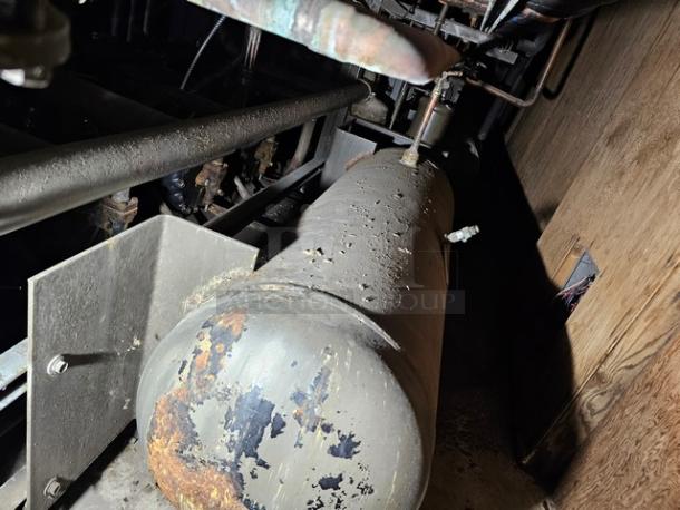 Commercial refrigeration compressor rack, medium temp, 134A, 40 HP, visible wear, requires removal by buyer.