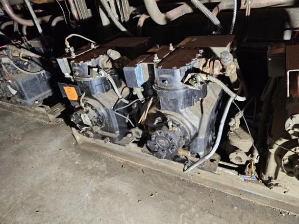 Commercial refrigeration compressor rack, medium temp, 134A, 40 HP, as-is condition, visible wear, proper removal required.