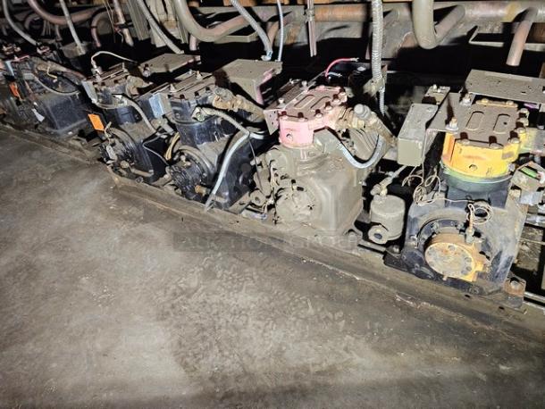 Commercial refrigeration compressor rack, medium temp, model 134A, 40 HP, showing multiple units and wiring.