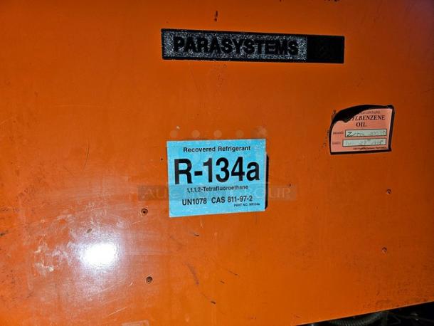 Orange commercial refrigeration compressor rack with "PARASYSTEM" label. Marked for use with R-134A refrigerant. Medium temp, 40 HP.
